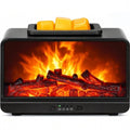 Black rectangular fireplace wax warmer with glowing logs, an orange flame display, and three yellow wax cubes in the top tray.