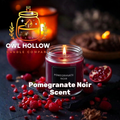 Pomegranate Noir graphic with a burgundy candle in a clear glass jar